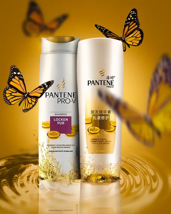 Pantene Pro-V bottles on gold with butterflies