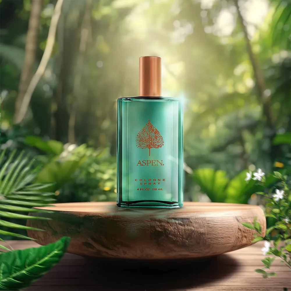 A perfume bottle photographed on a wooden stand in a jungle setting